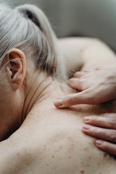 pexels photo 7235054 7235054 1 Close-up of a shoulder massage showing gentle hand pressure for relaxation.